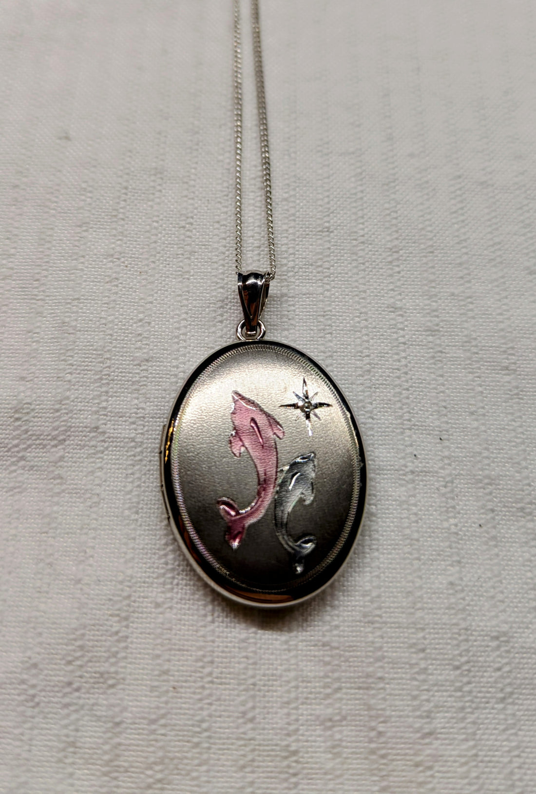 Locket with dolphins  sterling silver