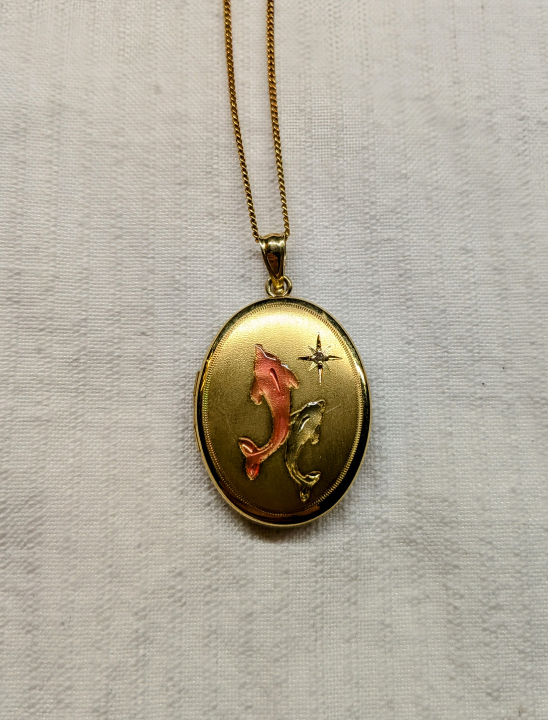 Locket with dolphins Gold plated sterling silver