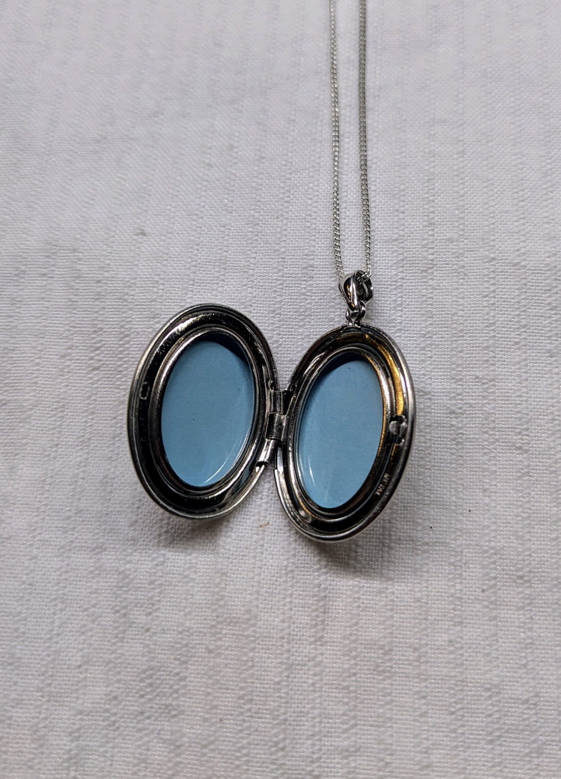 Locket with dolphins  sterling silver