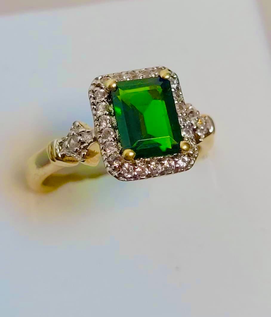 Emerald gold halo ring