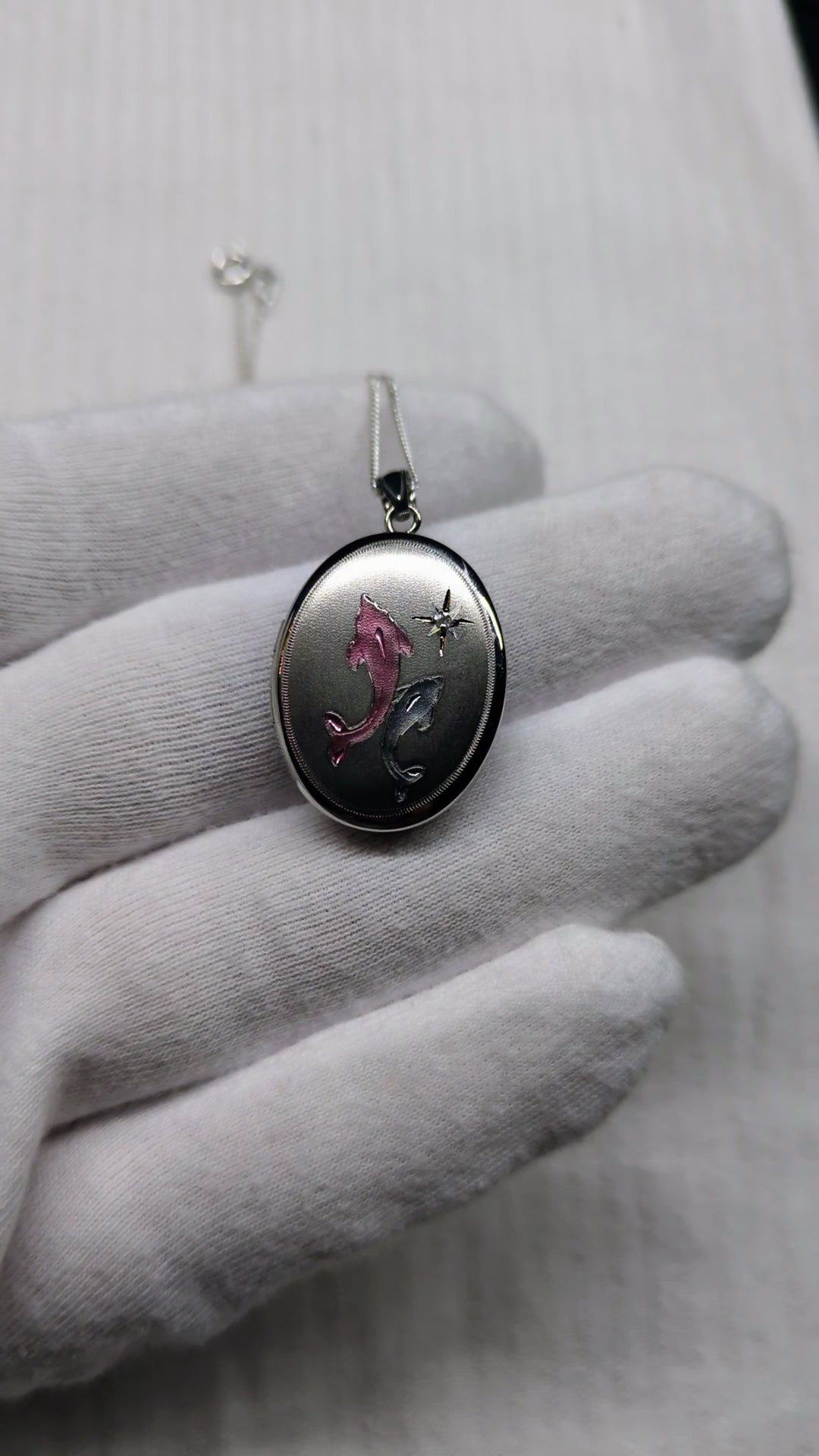 Locket with dolphins  sterling silver