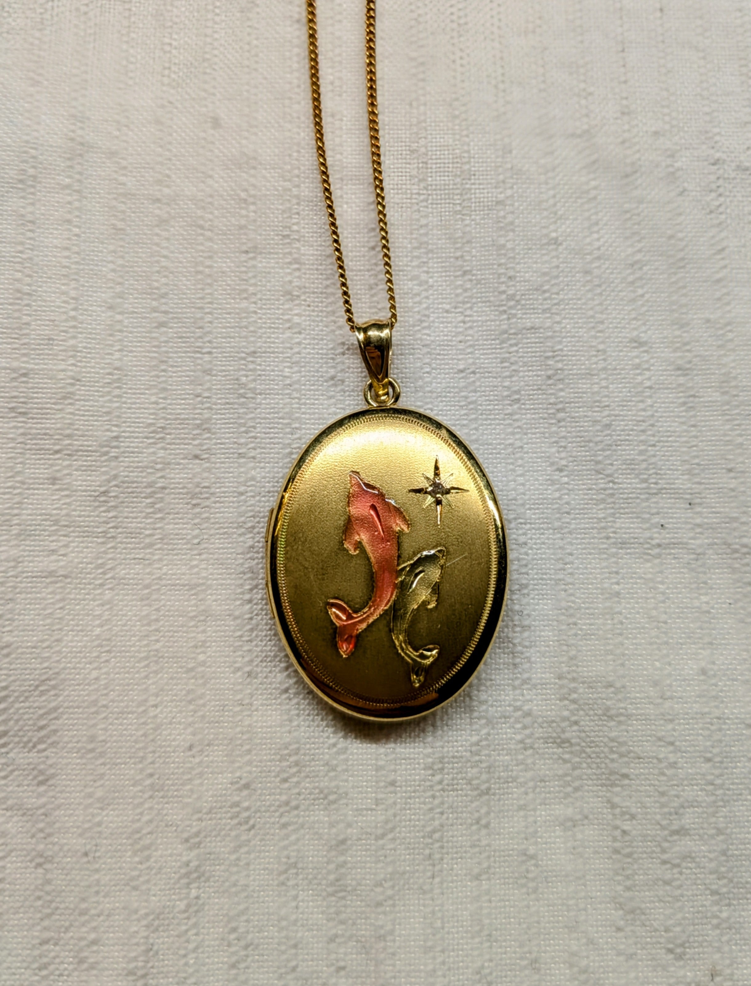 Locket with dolphins Gold plated sterling silver