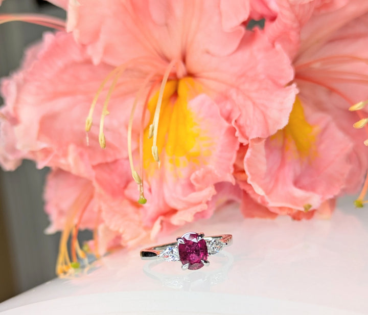 Ruby 0.918 carat natural untreated Ruby Oval in 18K white gold with 2 D-color pear shape diamonds at 0.26carats, 2.97 grams gold