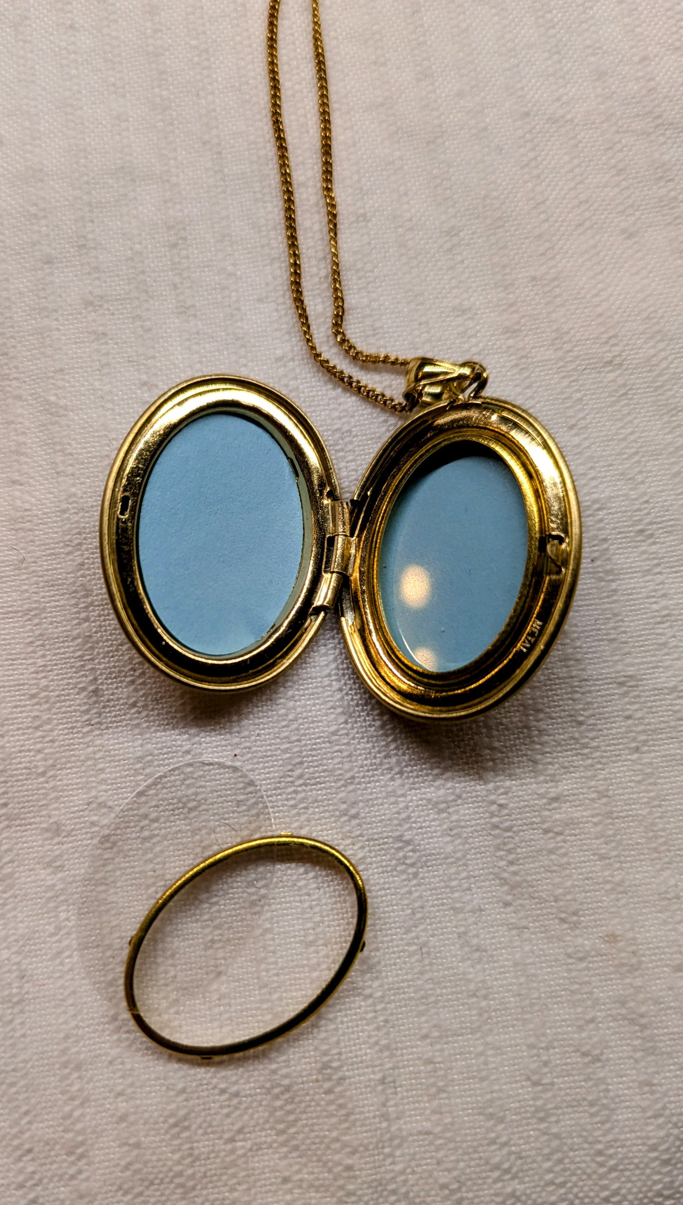 Locket with dolphins Gold plated sterling silver