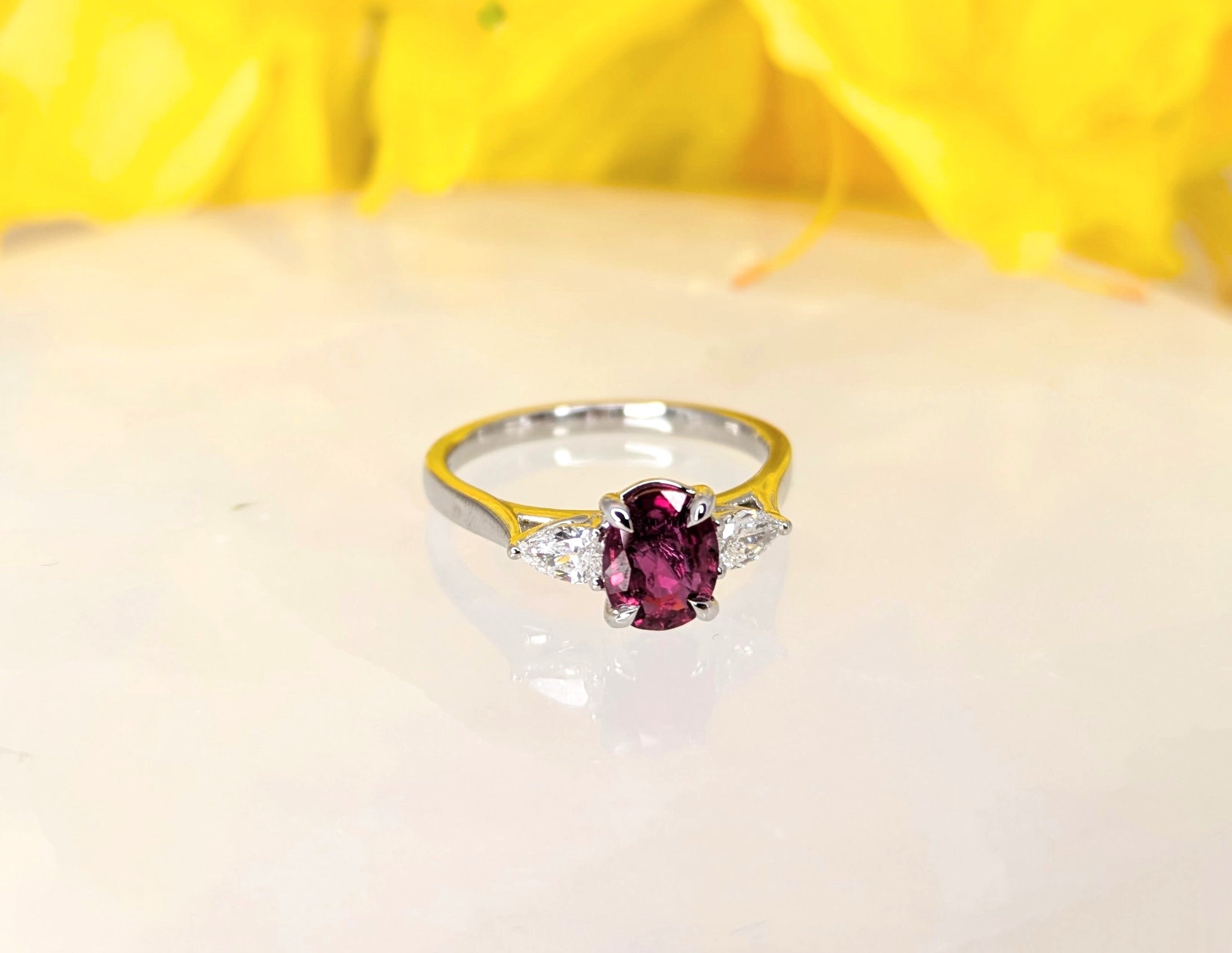 Ruby 0.918 carat natural untreated Ruby Oval in 18K white gold with 2 D-color pear shape diamonds at 0.26carats, 2.97 grams gold